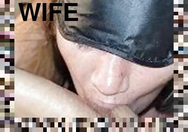 Blindfolded wife sucks balls
