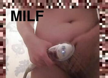 Milf washes in the bathroom