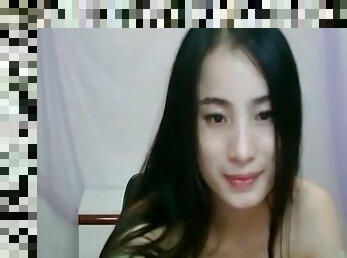 Cute Asian webcam girl models her tits