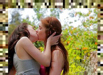 Fabulous redhead lesbian with natural tits getting her pussy licked outdoors