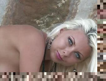 Slender Blonde Teen Is Posing Naked Near The Rocks