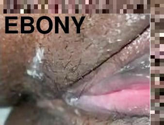 Petite teen ebony plays with wet creamy pussy