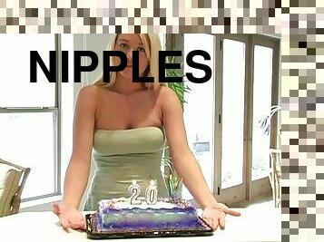 A sexy girl licks her nipples at her 20th birthday