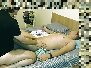 A guy comes after work tired and gets a massage while relaxing