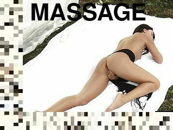 Hot girl massages oil on her sexy body while masturbating