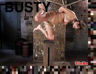 Tied up busty bdsm sub fingered and whipped