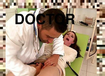 The doctor shoves his cock down her throat and makes her gag