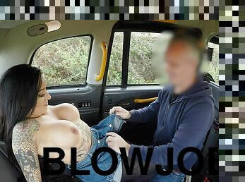 Inked slut Beth Adams pays for a ride with her wet cunt