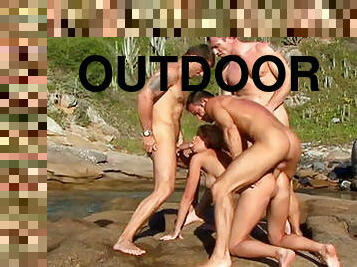 Outdoors gang-bang for a slut