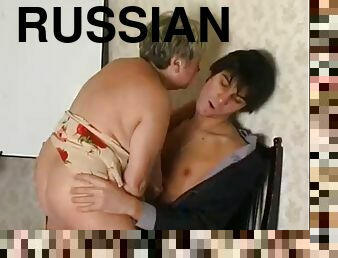 Sex of a horny Russian granny with a guy