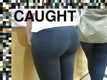 Big round ass in tight spandex gets caught on secret camera