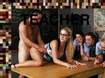Horny blonde teacher shows her students how to suck cock