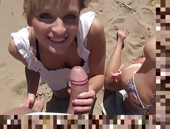 naughty girls share thick dick on the beach