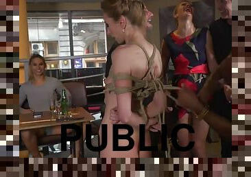 Bitch tied up in public is disciplined by her owners