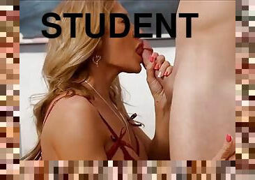 Student takes a sex lesson from this beautiful teacher with silicone tits