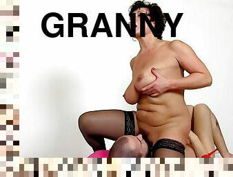 Face sitting action with brunette granny