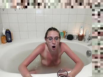 Nerd teen girl takes a bathtub for webcam