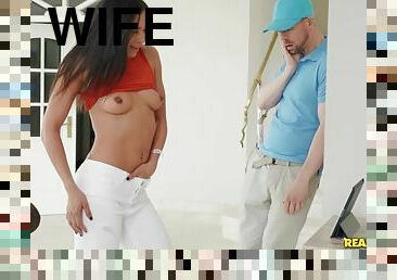 A housewife is cheating so that her husband could watch the web camera