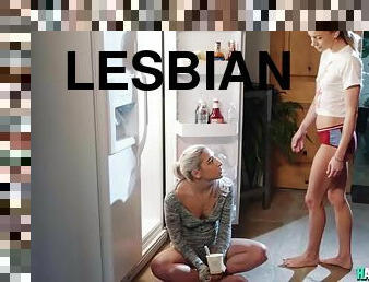 Steamy lesbians having sex in the kitchen