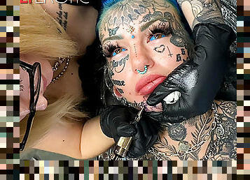 Australian bombshell Amber Luke gets a new chin tattoo