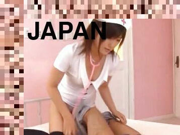 Japanese nurse enjoys while giving a footjob in the hospital