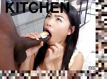 Interracial fucking in the kitchen with cute Asian Cindy Starfall