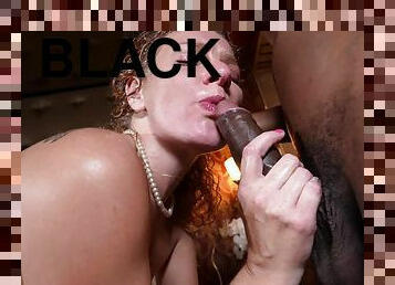 Curly haired chick Jennifer Red enjoys having sex with a black man