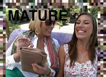 Horny mature Melanie Monroe shares a dick with sexy Rilynn Rae