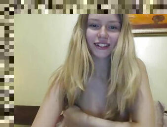 Cute teen undresses and orgasms in front of her webcam