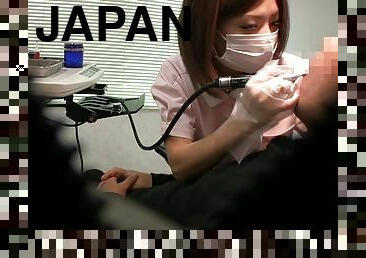 Naughty Japanese dentist gets talked into sucking his hard dick