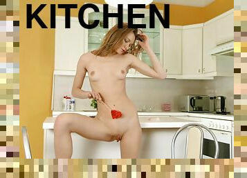 Kristi plays with her lollipop and masturbates in the kitchen