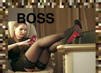 Your Chief: Jeny Smith plays the role of the boss. High heels, stockings and mini skirt.