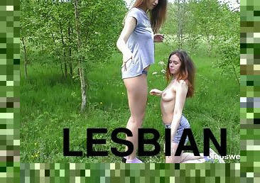 Horny lesbian lovers have nice sex with sex toys in outdoors