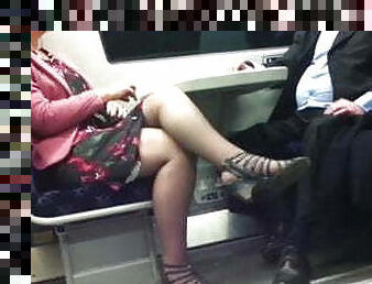 Mature with sexy legs in the train