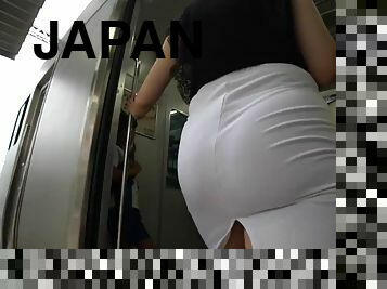 Japanese MILF in white skirt