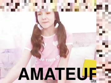 Pigtailed brunette amateur teen posing on webcam then stripping pink t shirt