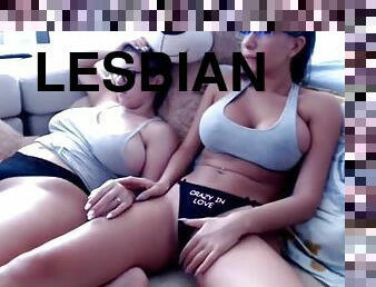 Two lesbians in glasses on webcam