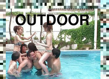 Outdoors lesbian fucking in the pool with some very lucky guys