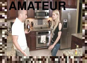 Amateur blonde girl Stella Banxxx gives a handjob in the kitchen