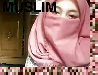 Hijab Muslim girl undressing