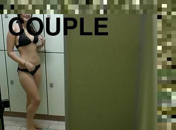 Hot couple decides to get it on in a noisy changing booth at a swimming pool