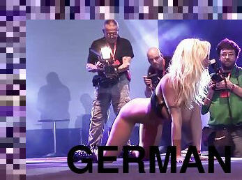 big boob german milf toying on public stage