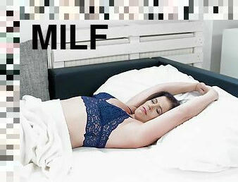 Sleepy milf Montse Swinger masturbates on her bed with a dildo