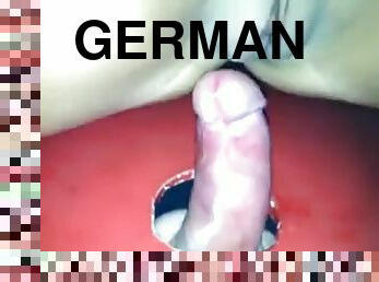 German wife taking a load at in her hole at a hole
