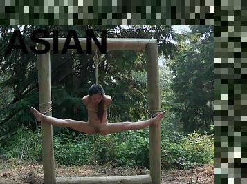 Forest hardcore bondage fetish scene with Asian babe Elle Voneva