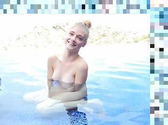 Skinny blonde teen Hannah swims naked and poses all wet