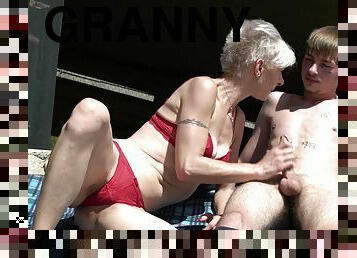 Short haired granny Martina Mercedes gets a facial on the roof