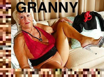 Blonde granny Mandi plays with her saggy tits and a shaved pussy