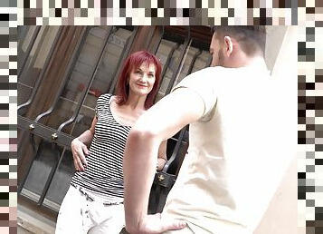 Mature redhead Irena picks up a guy off the street for a hard fuck