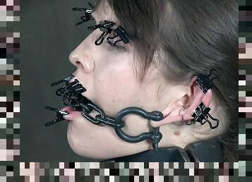 Blossom gets chained and her tits and mouth clamped and abused